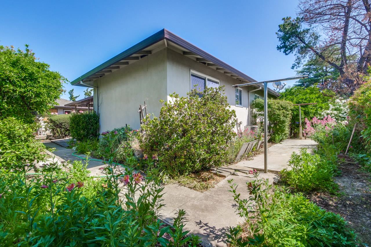 2738 Cramer Circle San Jose, CA 95111 - Photo 22 of 63 a front view of a house with a yard