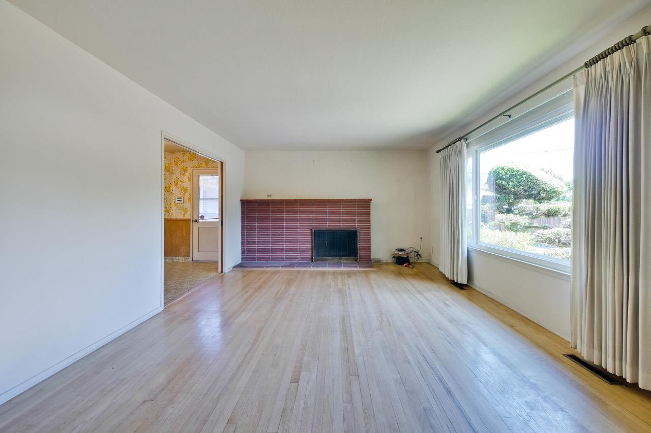 2738 Cramer Circle San Jose, CA 95111 - Photo 25 of 63 an empty room with wooden floor and windows