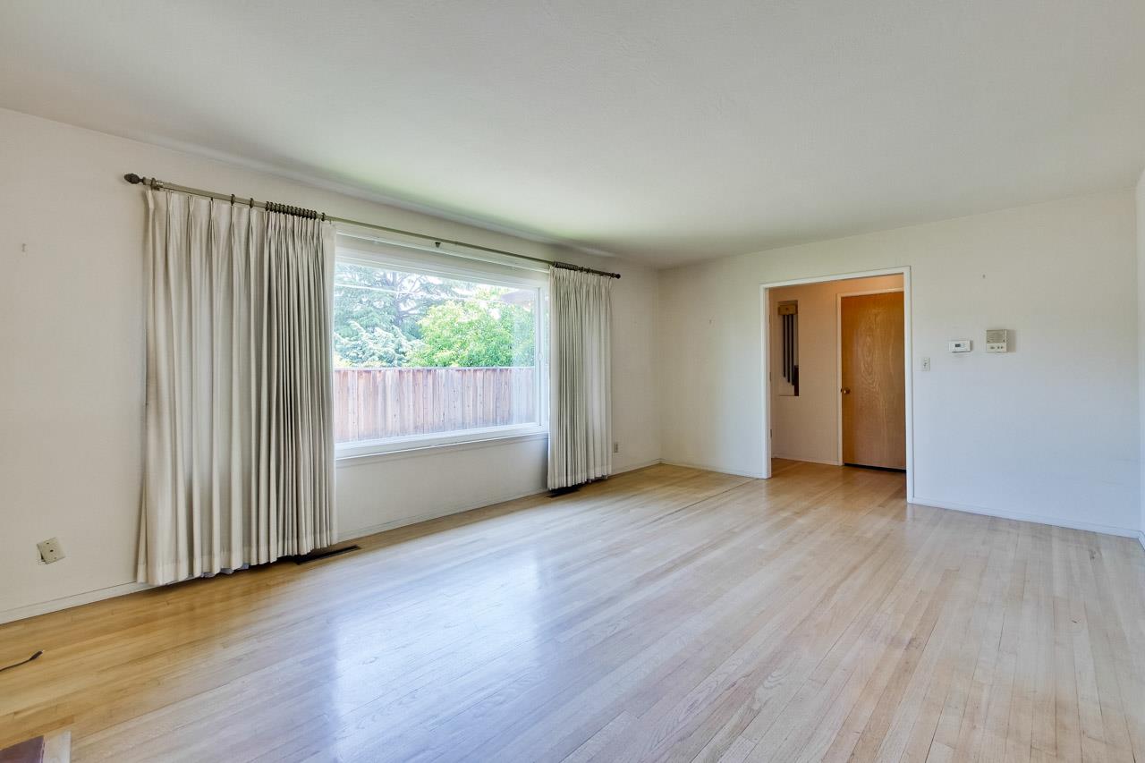 2738 Cramer Circle San Jose, CA 95111 - Photo 29 of 63 an empty room with wooden floor and windows