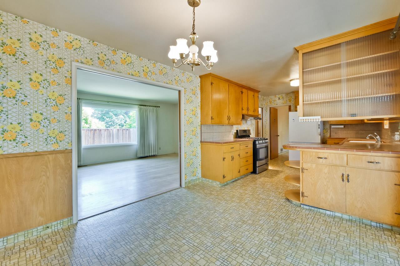 2738 Cramer Circle San Jose, CA 95111 - Photo 32 of 63 a view of a kitchen with a sink and dishwasher cabinets
