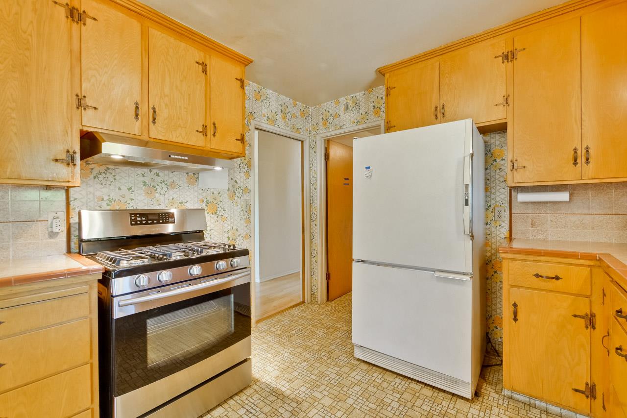 2738 Cramer Circle San Jose, CA 95111 - Photo 39 of 63 a kitchen with a refrigerator stove and a sink