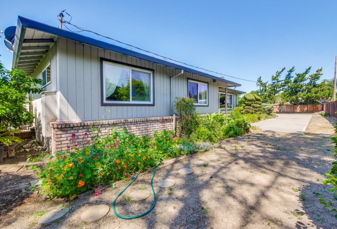 2738 Cramer Circle San Jose, CA 95111 - Photo 4 of 63 a front view of a house with garden