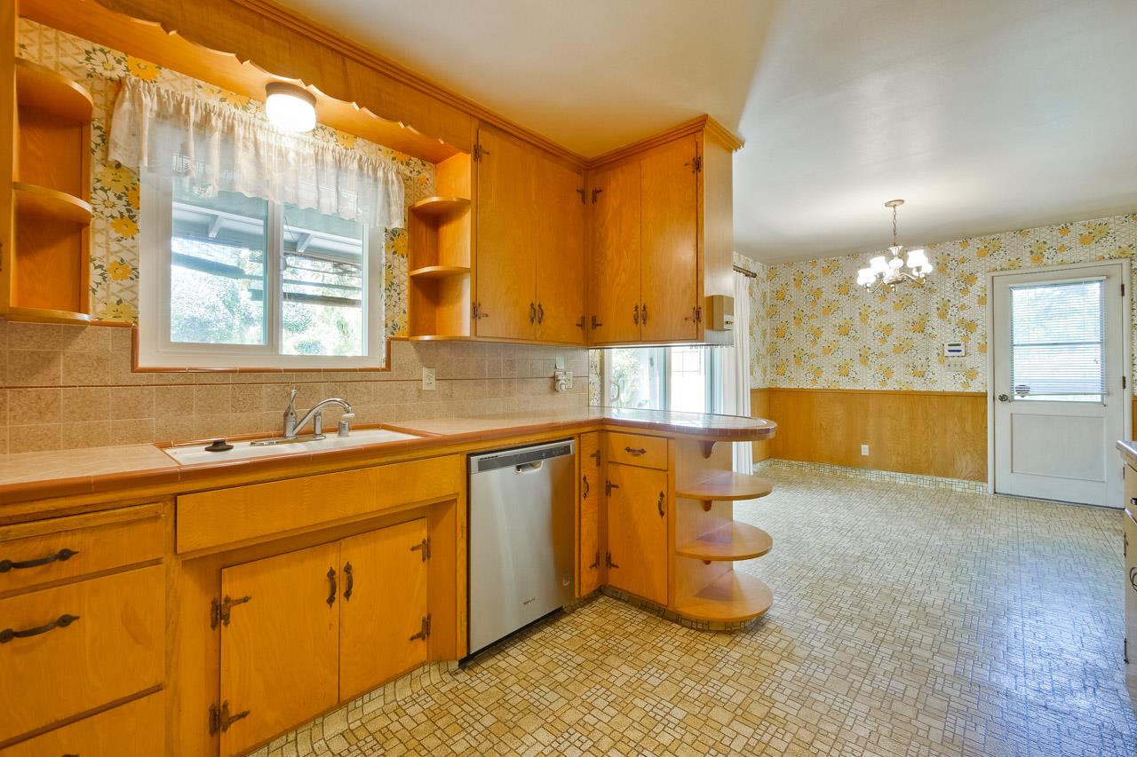 2738 Cramer Circle San Jose, CA 95111 - Photo 41 of 63 a kitchen with a sink cabinets and wooden floor