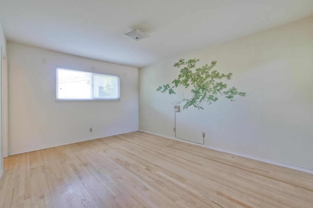2738 Cramer Circle San Jose, CA 95111 - Photo 44 of 63 an empty room with wooden floor and windows