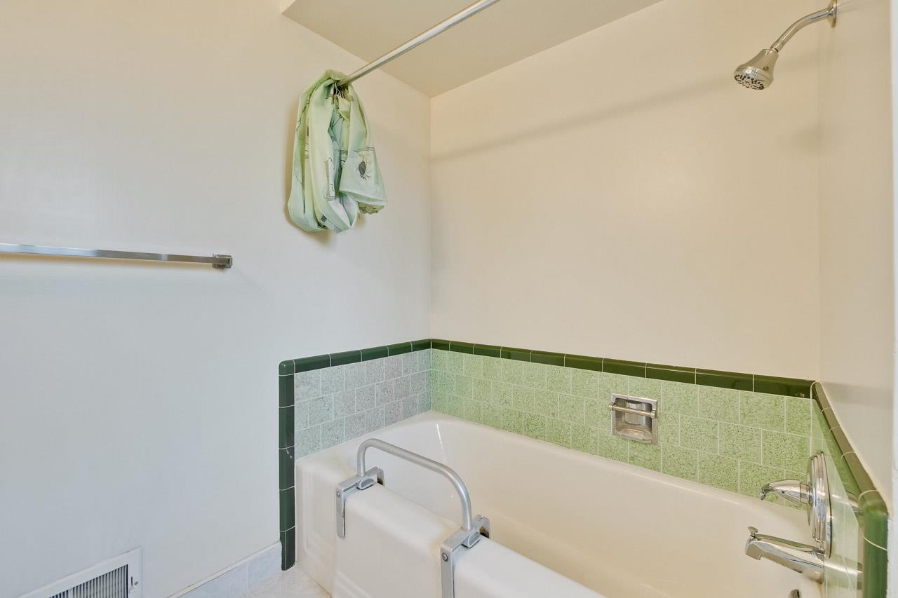 2738 Cramer Circle San Jose, CA 95111 - Photo 51 of 63 a bathroom with a bath tub and a window
