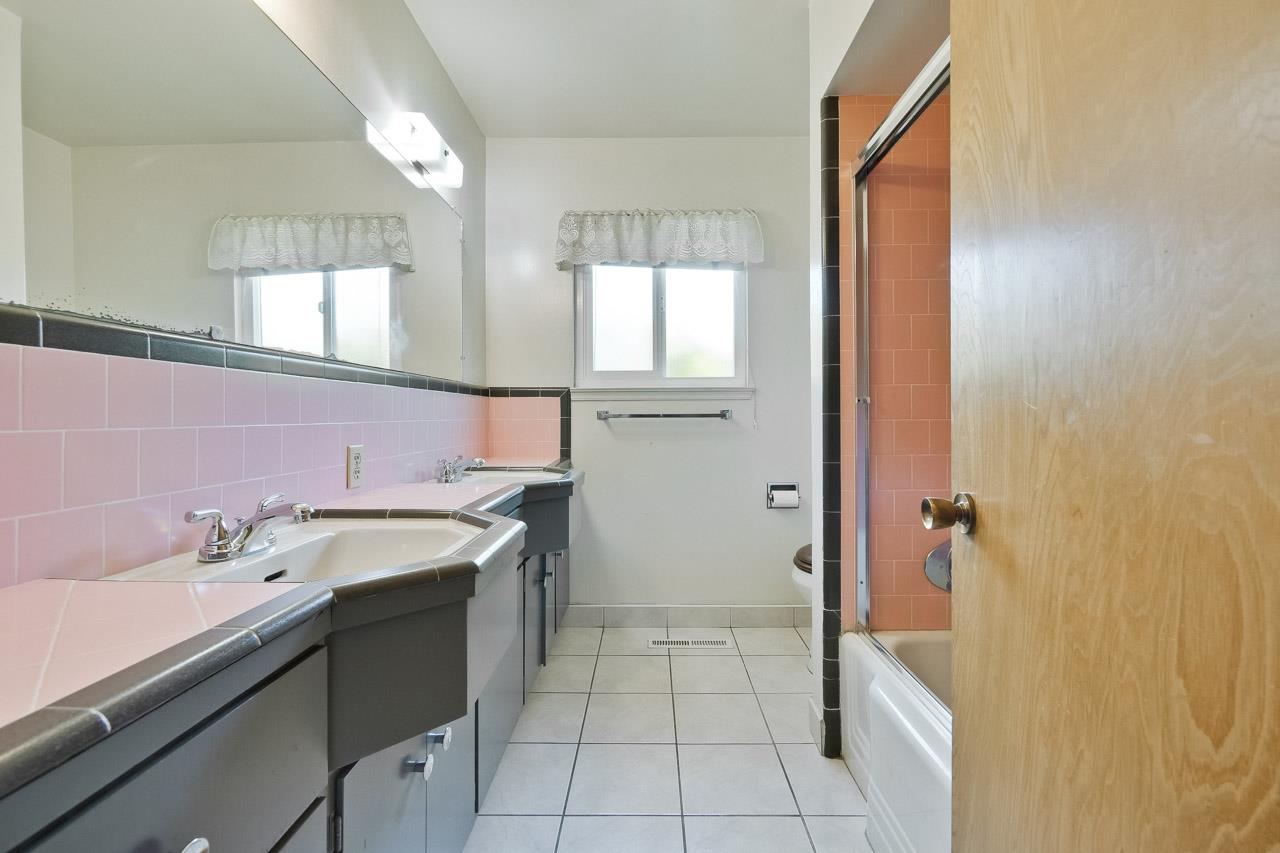 2738 Cramer Circle San Jose, CA 95111 - Photo 52 of 63 a bathroom with a sink and a mirror