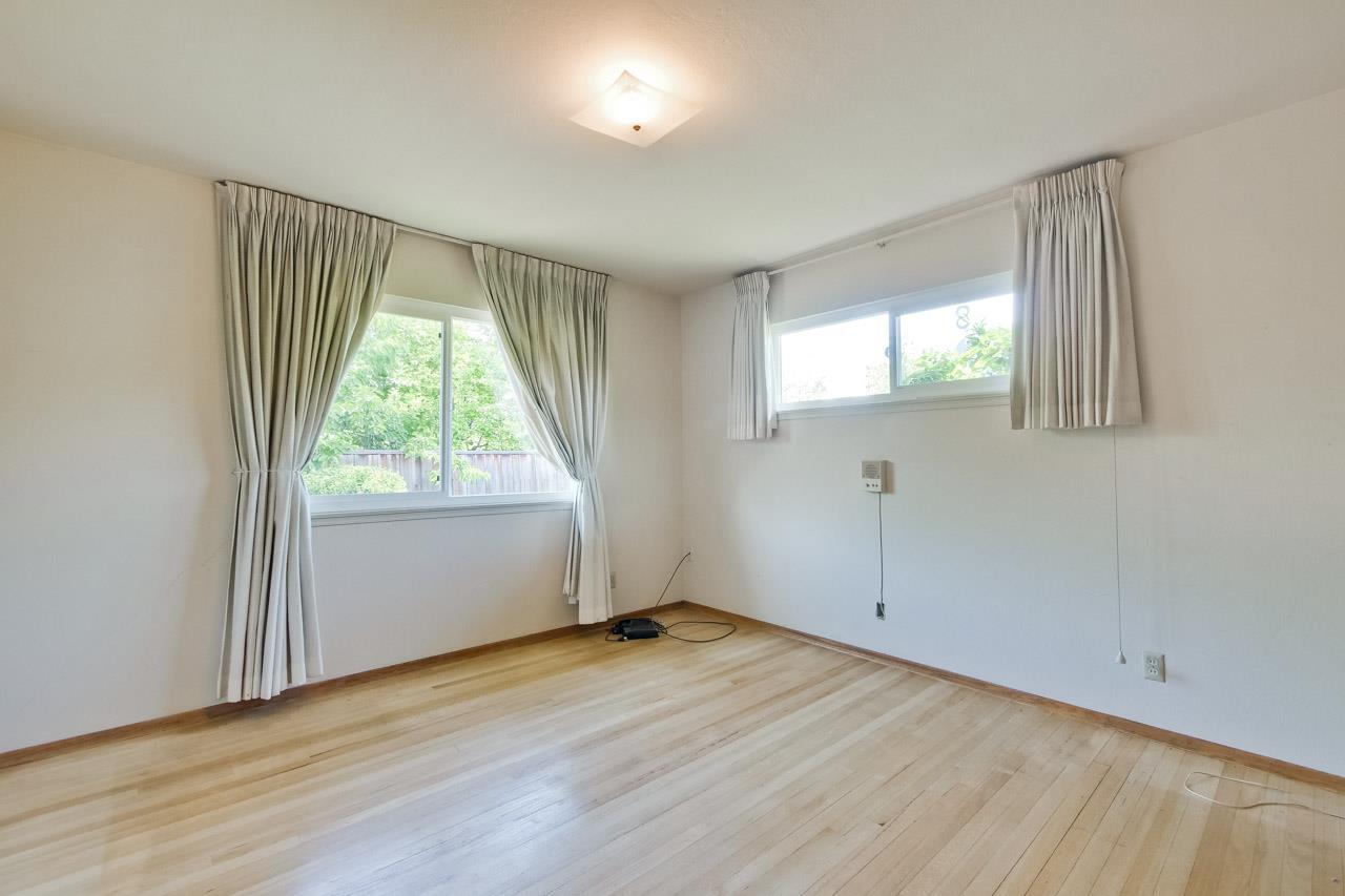 2738 Cramer Circle San Jose, CA 95111 - Photo 54 of 63 an empty room with wooden floor and windows