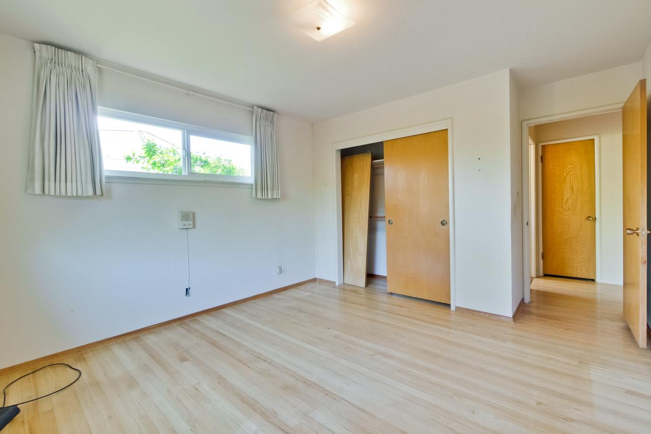 2738 Cramer Circle San Jose, CA 95111 - Photo 55 of 63 a view of an empty room with wooden floor and a window