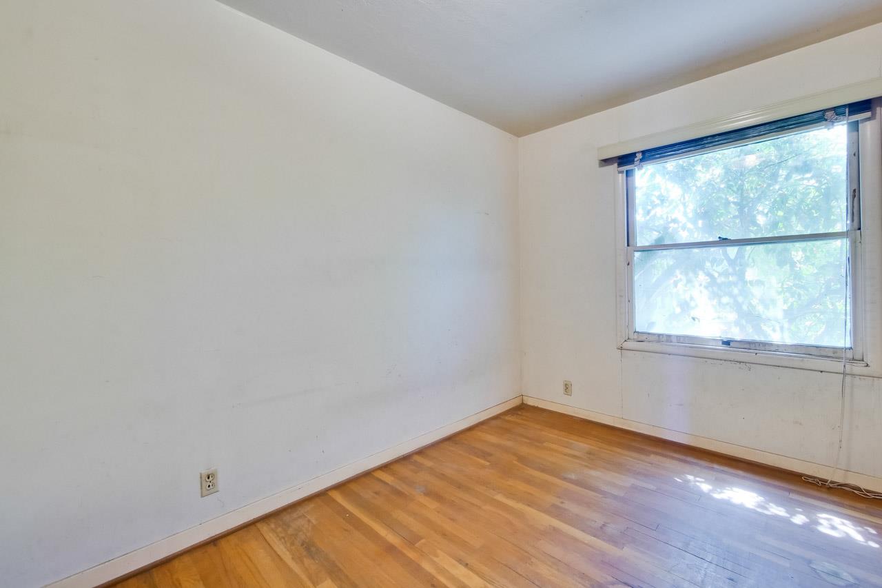 2738 Cramer Circle San Jose, CA 95111 - Photo 56 of 63 wooden floor in an empty room with a window