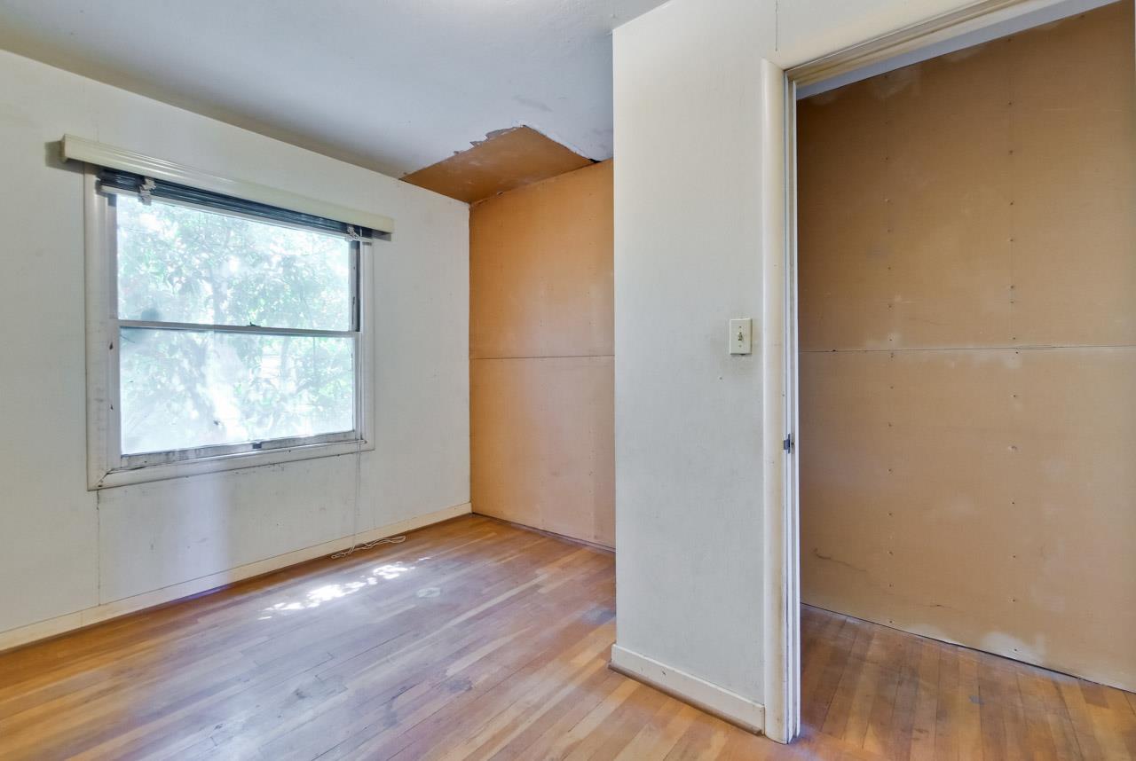2738 Cramer Circle San Jose, CA 95111 - Photo 57 of 63 an empty room with wooden floor and windows