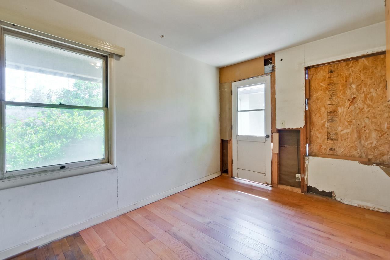2738 Cramer Circle San Jose, CA 95111 - Photo 60 of 63 a view of empty room with wooden floor and fan