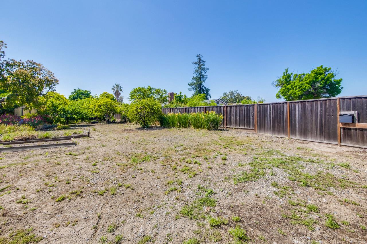 2738 Cramer Circle San Jose, CA 95111 - Photo 6 of 63 a view of swimming pool with wooden fence