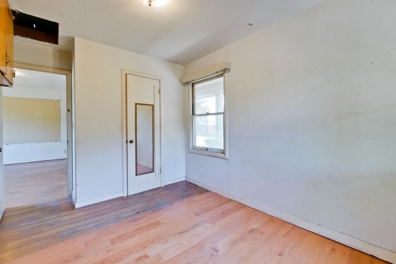 2738 Cramer Circle San Jose, CA 95111 - Photo 63 of 63 a view of an empty room with wooden floor and a window
