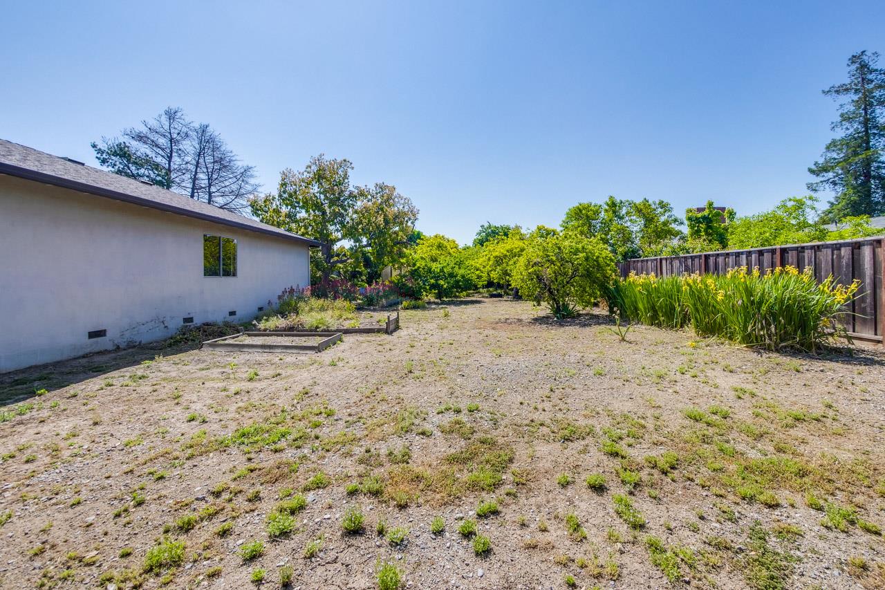 2738 Cramer Circle San Jose, CA 95111 - Photo 7 of 63 a backyard of a house with lots of green space