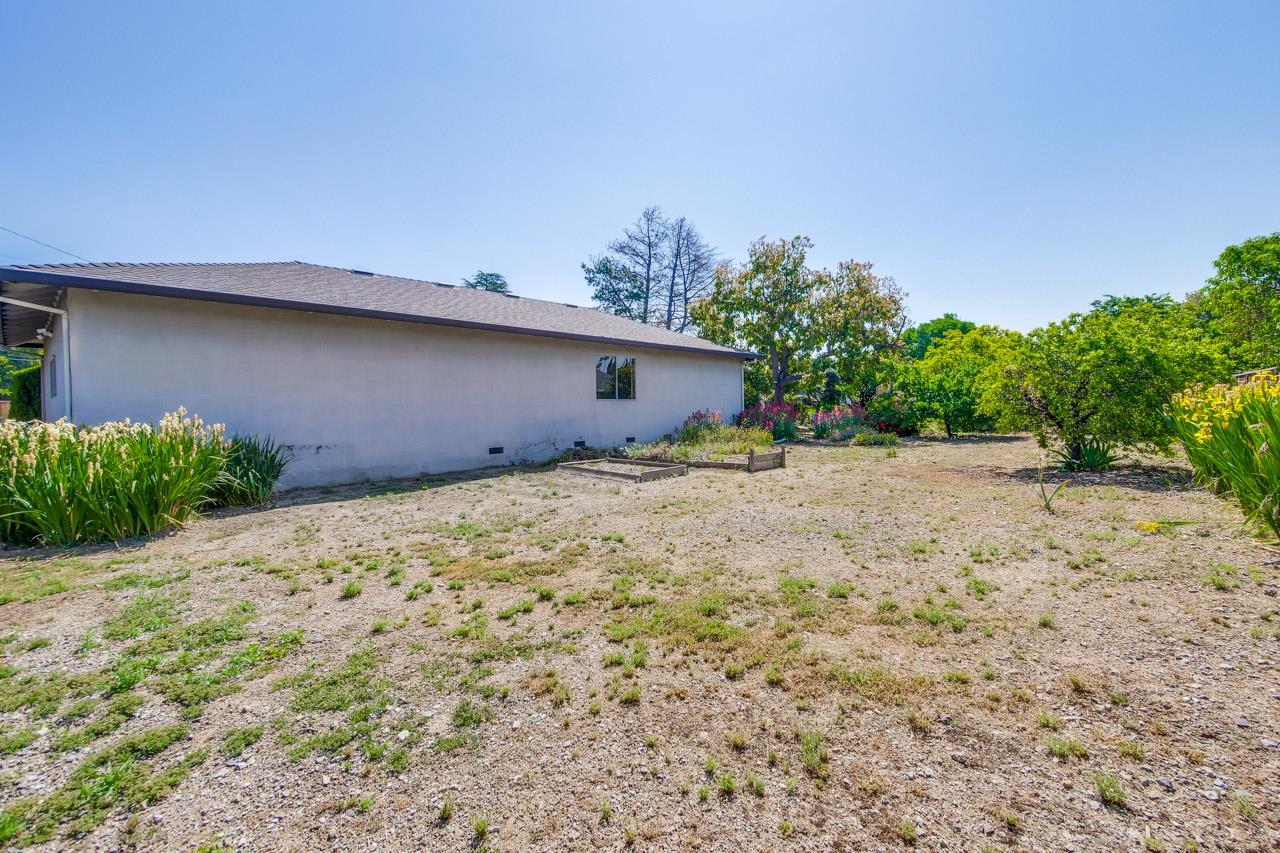 2738 Cramer Circle San Jose, CA 95111 - Photo 8 of 63 a front view of a house with a yard