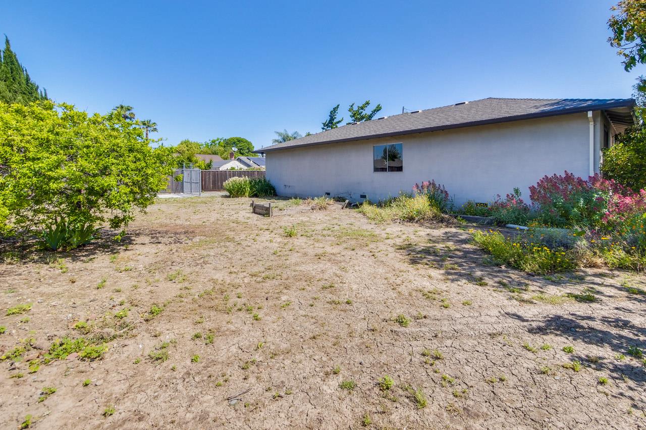 2738 Cramer Circle San Jose, CA 95111 - Photo 9 of 63 a backyard of a house with plants and trees