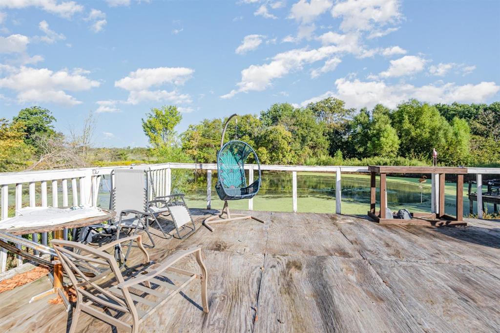 18888 Highway 274 Kemp, TX 75143 - Photo 27 of 30 a view of a house with backyard porch and sitting area