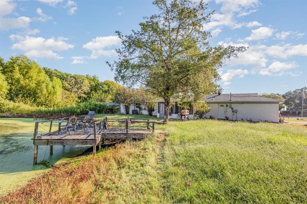 18888 Highway 274 Kemp, TX 75143 - Photo 3 of 30 a view of house with outdoor space and sitting area