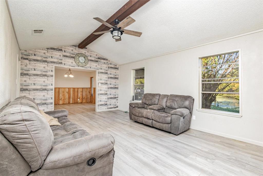18888 Highway 274 Kemp, TX 75143 - Photo 7 of 30 a living room with furniture and a large window