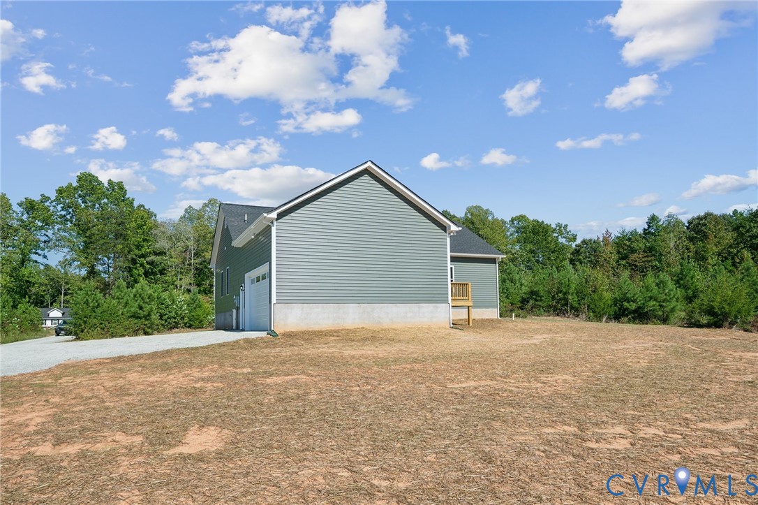 75 Oak Hill Road Cumberland, VA 23040 - Photo 31 of 34 a view of an house with backyard and garden