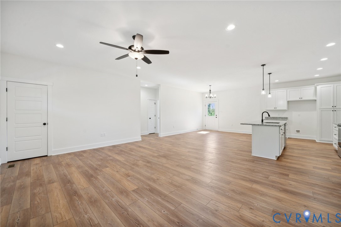 75 Oak Hill Road Cumberland, VA 23040 - Photo 6 of 34 a view of kitchen and empty room with wooden floor