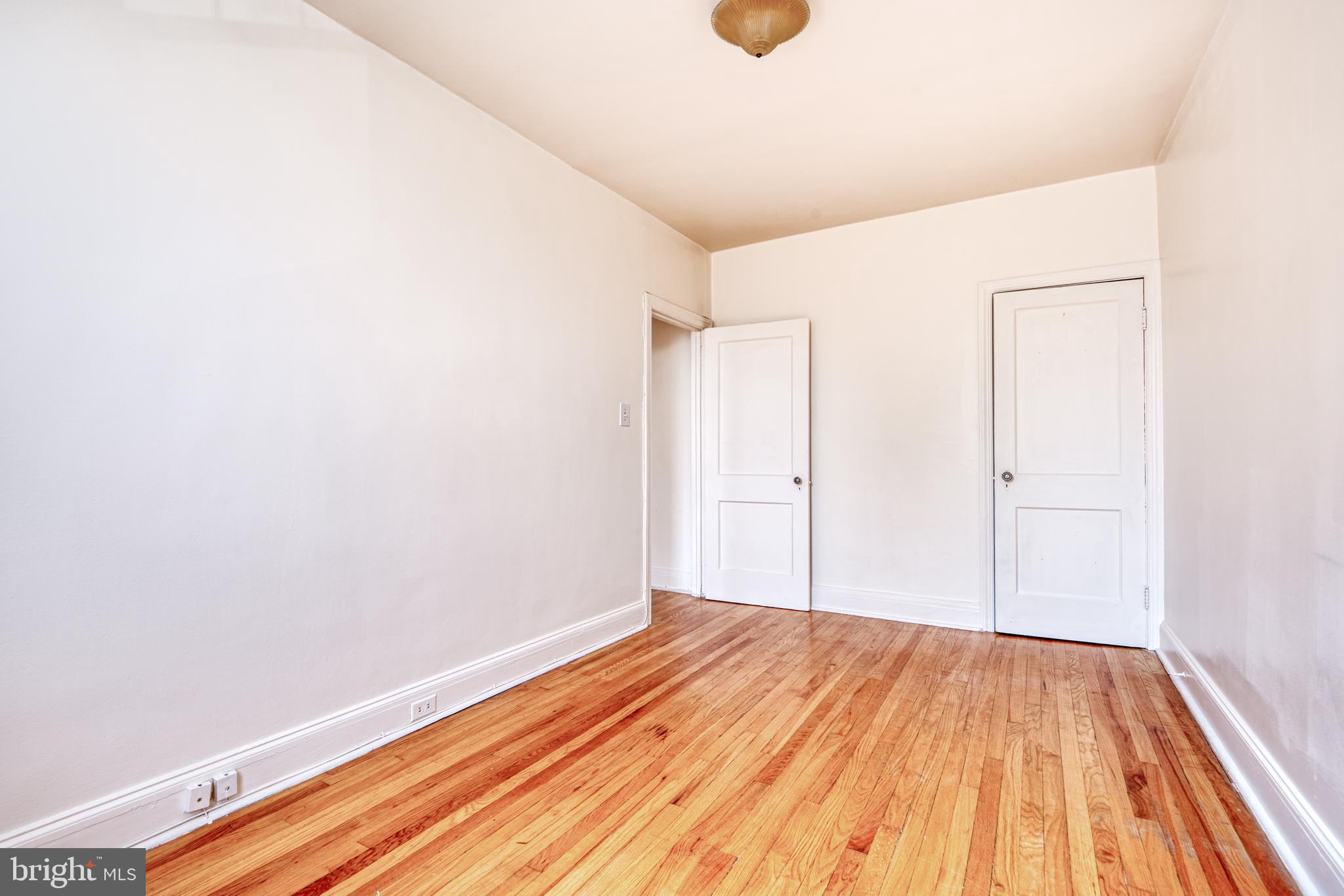 3621 Elkader Road Baltimore, MD 21218 - Photo 24 of 32 a view of a room with wooden floor