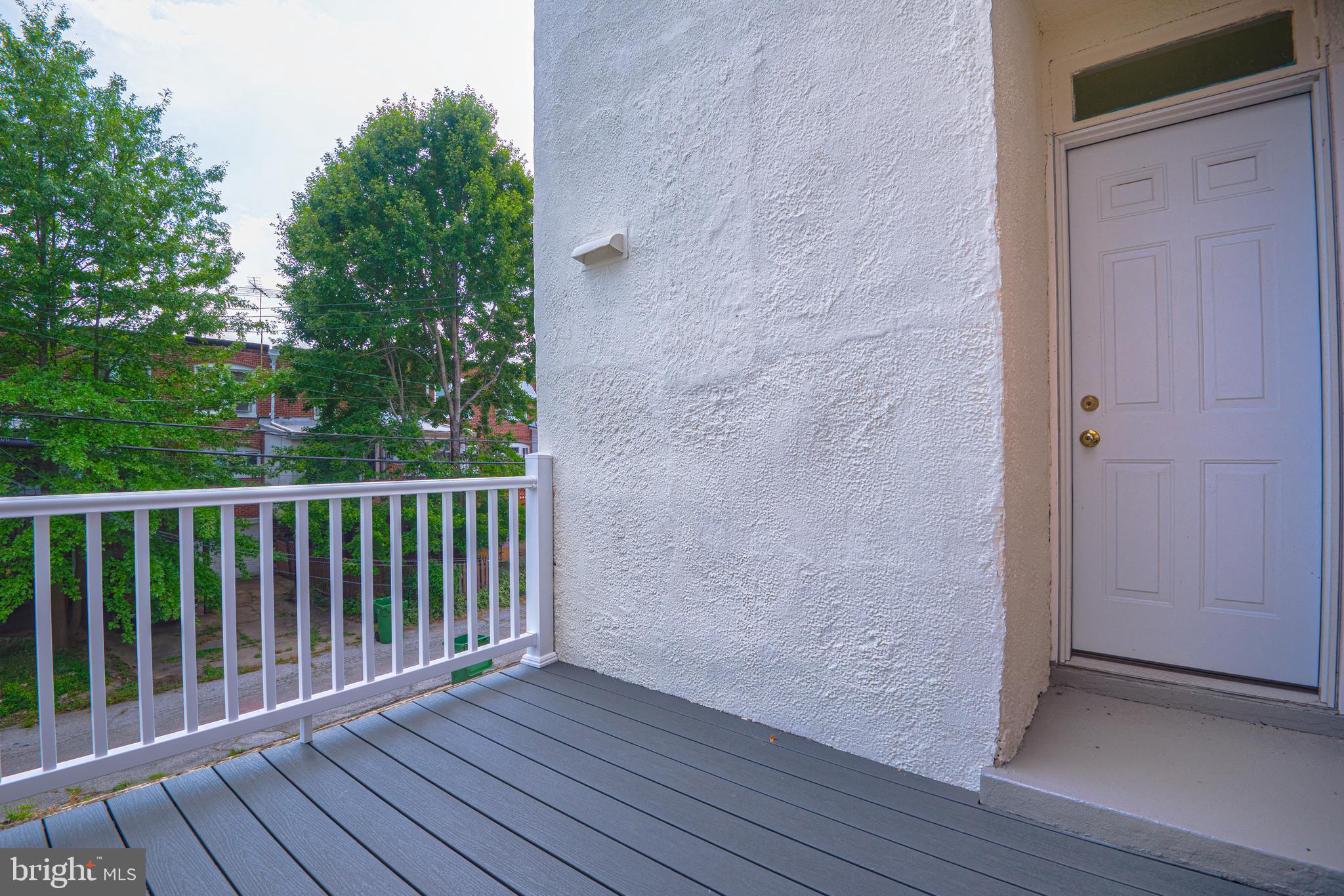 3621 Elkader Road Baltimore, MD 21218 - Photo 25 of 32 a view of balcony with wooden floor