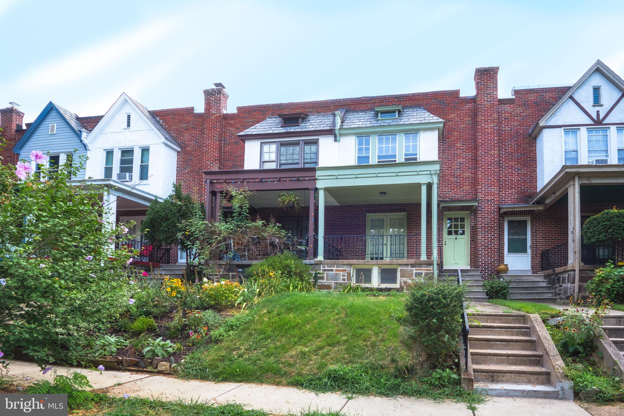 3621 Elkader Road Baltimore, MD 21218 - Photo 28 of 32 a front view of a building with garden