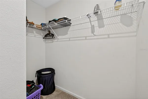 a bathroom with a sink and cabinets