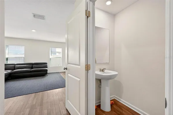 a view of a storage & utility room with a washer dryer