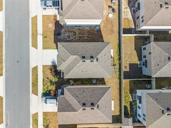 a front view of a house with yard