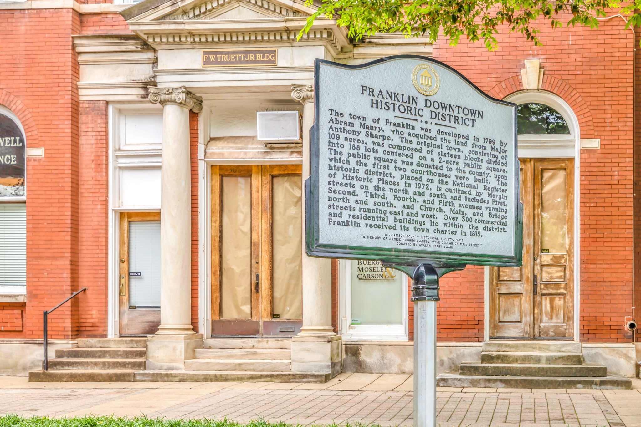 180 Strahl Street Franklin, TN 37064 - Photo 12 of 20 a view of a brick house with many windows