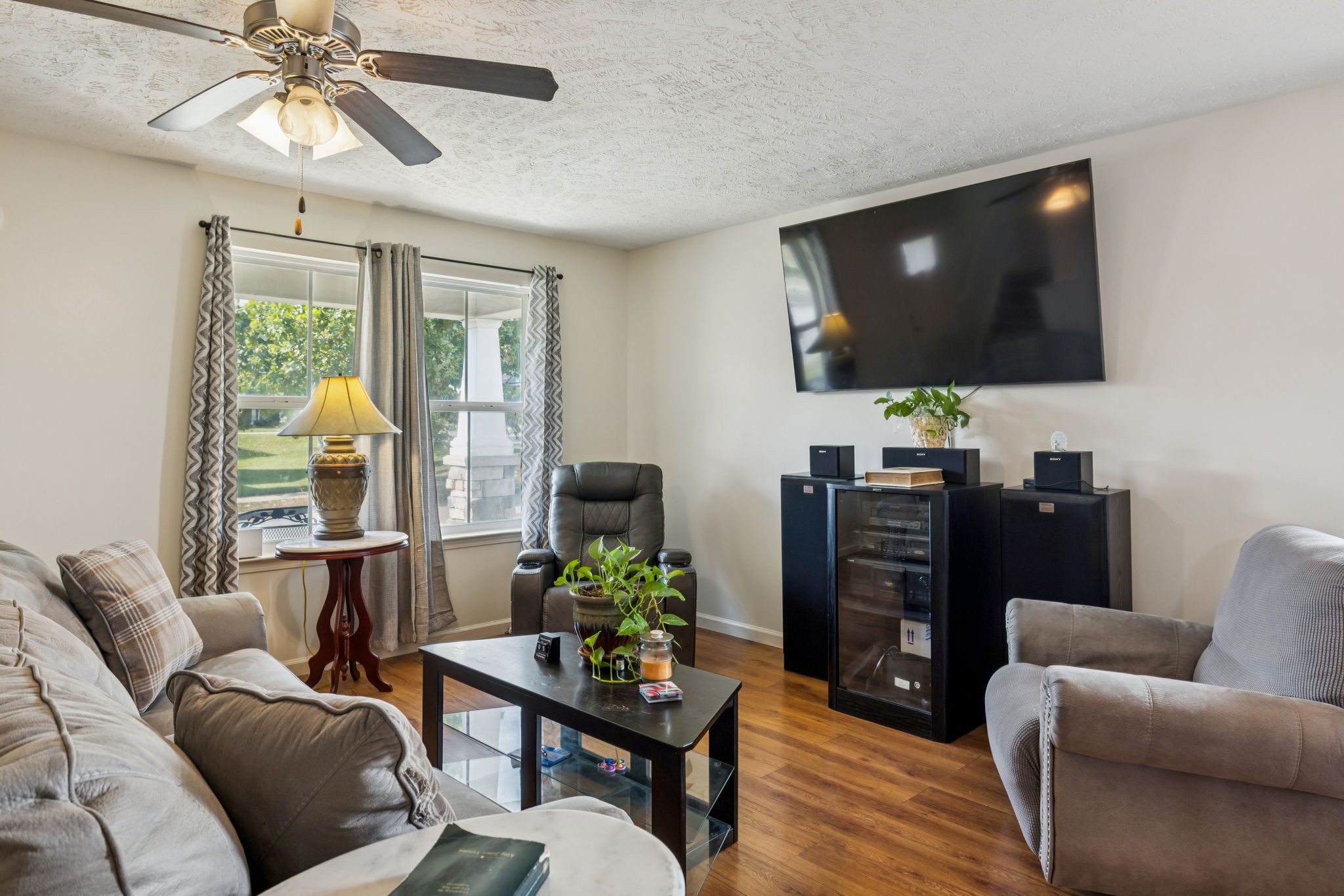180 Strahl Street Franklin, TN 37064 - Photo 2 of 20 a living room with furniture and a flat screen tv