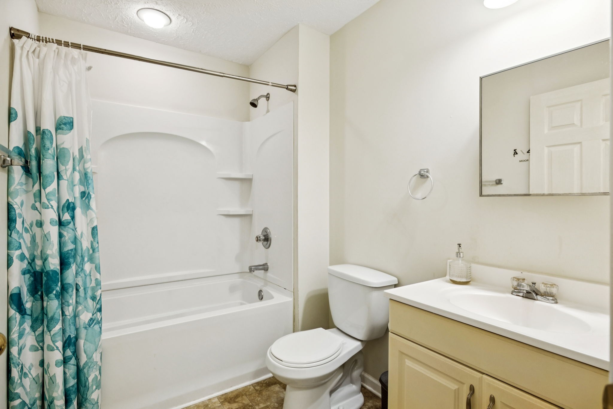 180 Strahl Street Franklin, TN 37064 - Photo 8 of 20 a bathroom with a sink a toilet and shower