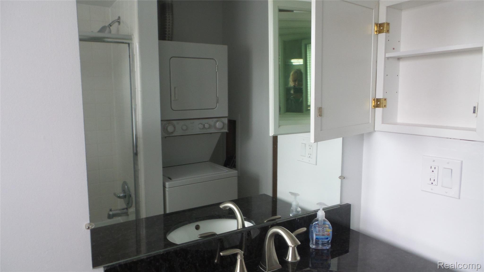 1516 Normandy Road, Unit 201 Royal Oak, MI 48073 - Photo 16 of 22 Bathroom with washer/dryer combo