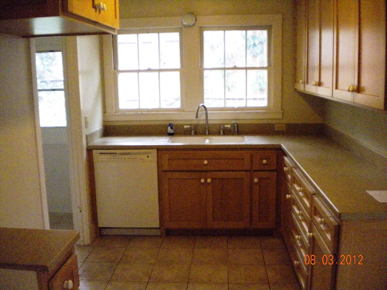 707 Moreno Road Santa Barbara, CA 93103 - Photo 6 of 11 a kitchen with stainless steel appliances granite countertop a sink and a stove