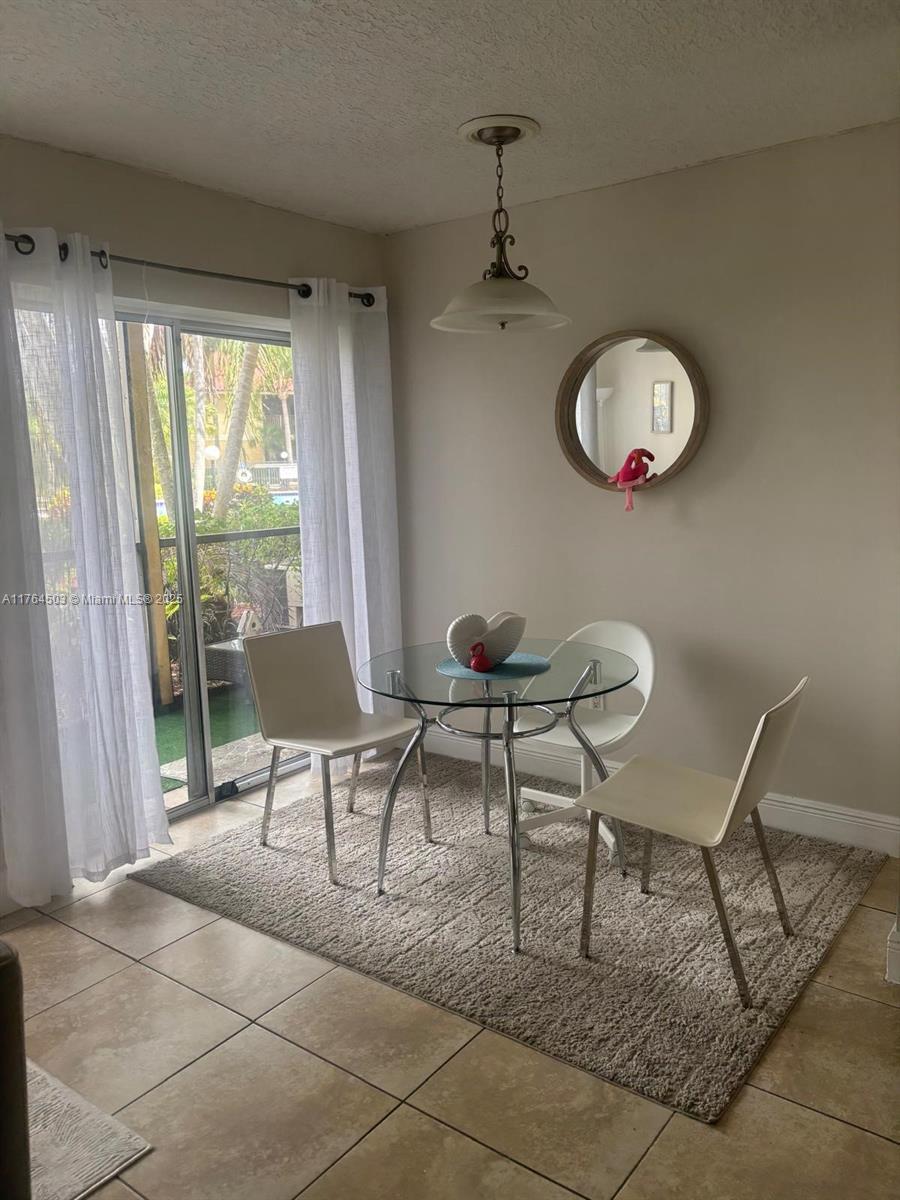 Royal Poinciana Condominium Pompano Beach, FL 33069 - Photo 7 of 11 a view of a dining room and livingroom