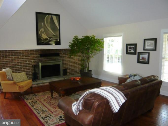 9467 Old Waterloo Road Warrenton, VA 20186 - Photo 5 of 13 a living room with furniture and a fireplace