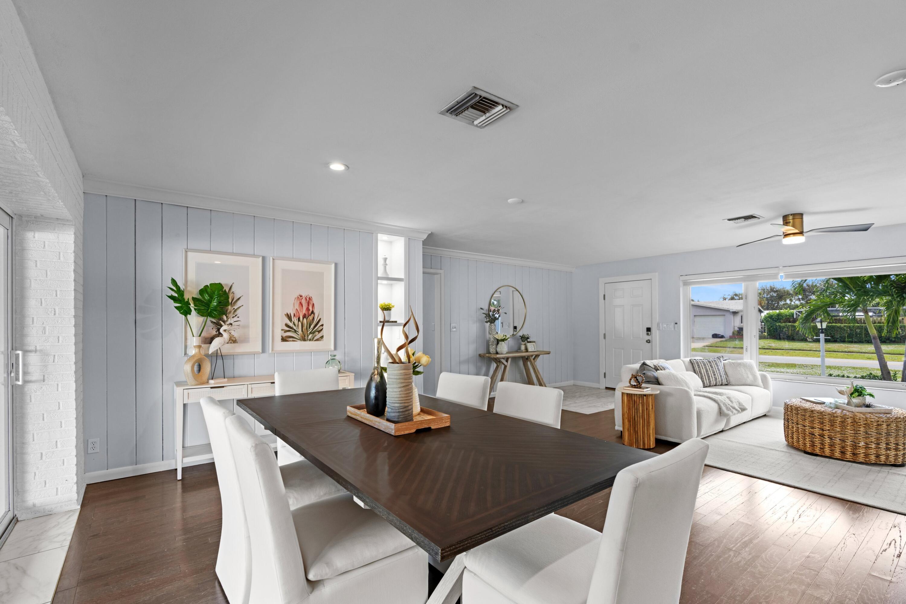 541 Kingfish Road North Palm Beach, FL 33408 - Photo 29 of 43 a view of a dining room with furniture window and outside view