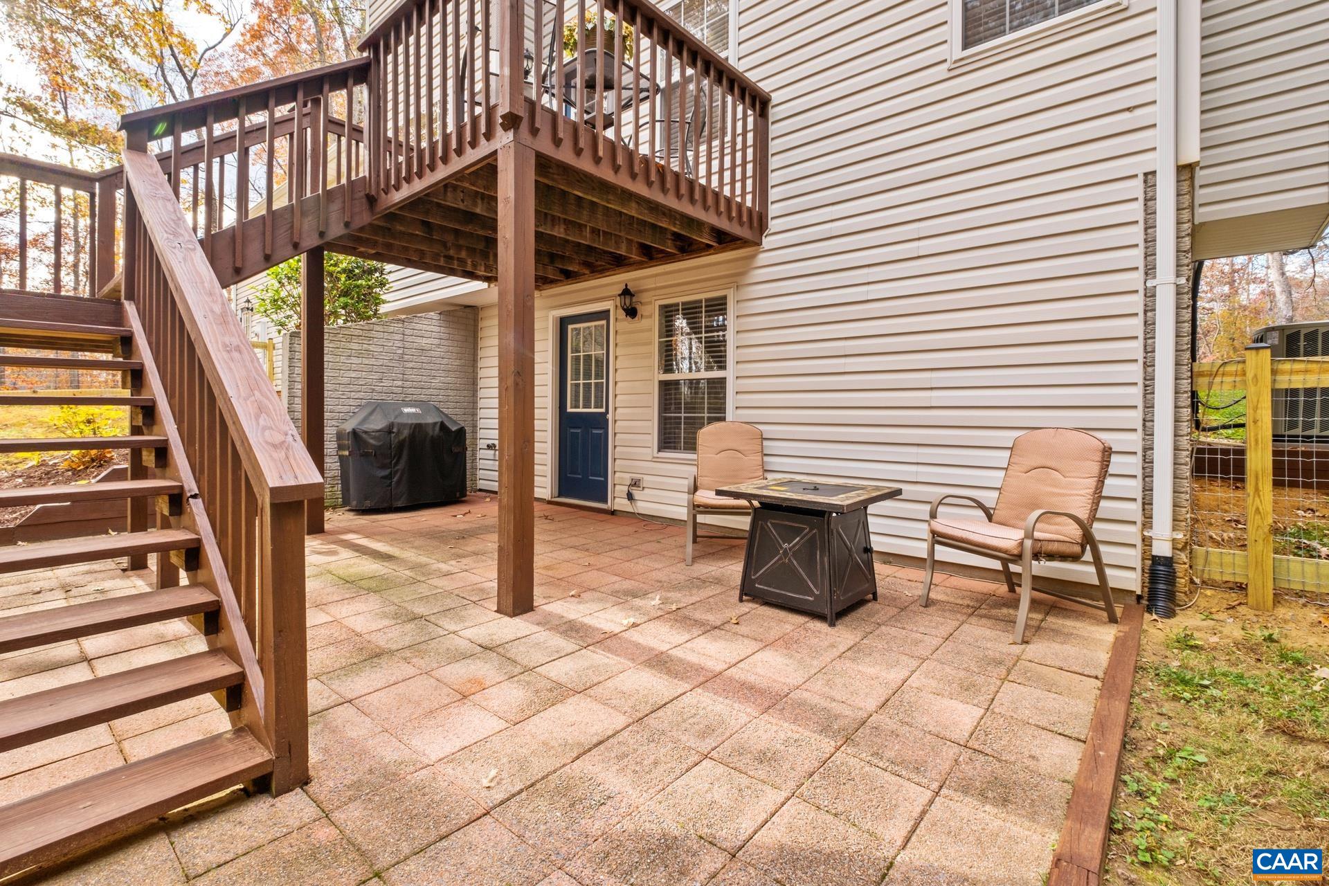 500 Northridge Road Ruckersville, VA 22968 - Photo 38 of 42 a roof deck with table and chairs