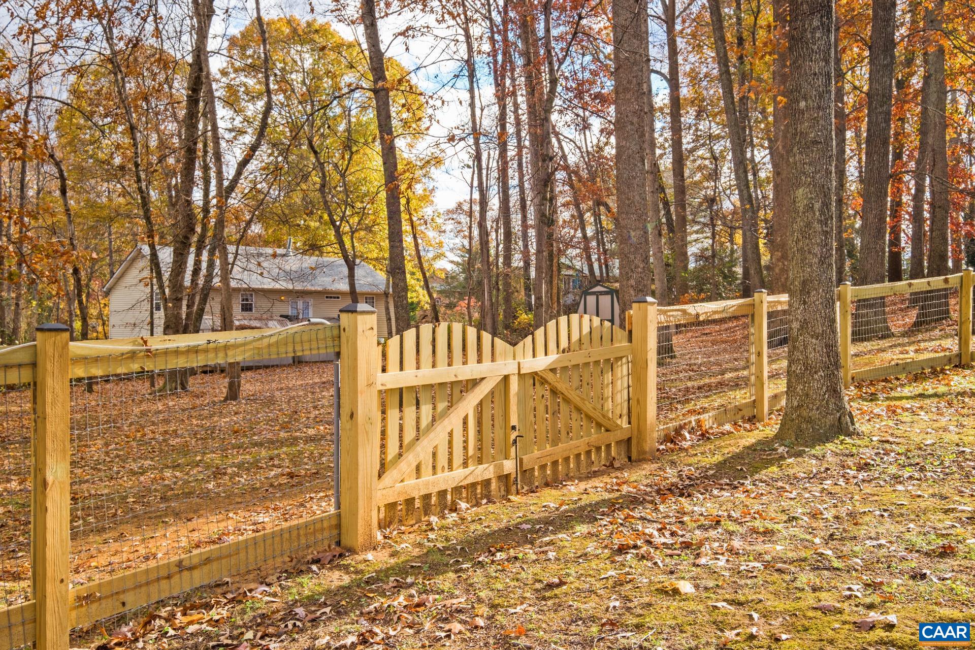 500 Northridge Road Ruckersville, VA 22968 - Photo 40 of 42 a view of a pathway with wooden fence