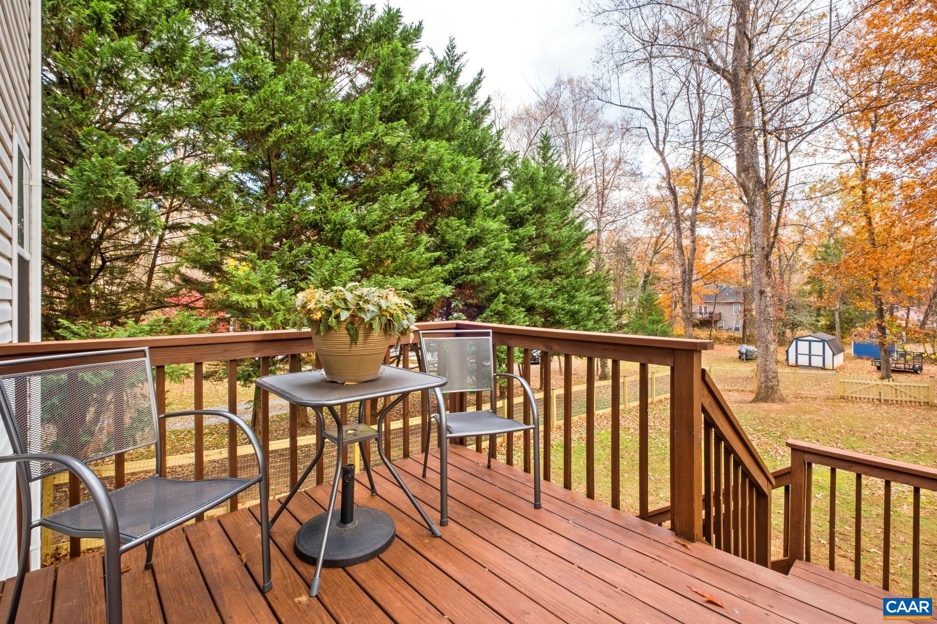 500 Northridge Road Ruckersville, VA 22968 - Photo 42 of 42 a view of a two chairs and table on the wooden floor