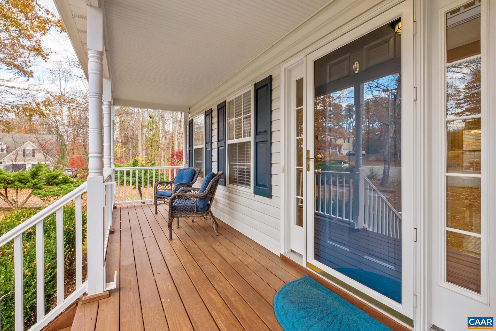 500 Northridge Road Ruckersville, VA 22968 - Photo 6 of 42 a view of a balcony with wooden floor and furniture