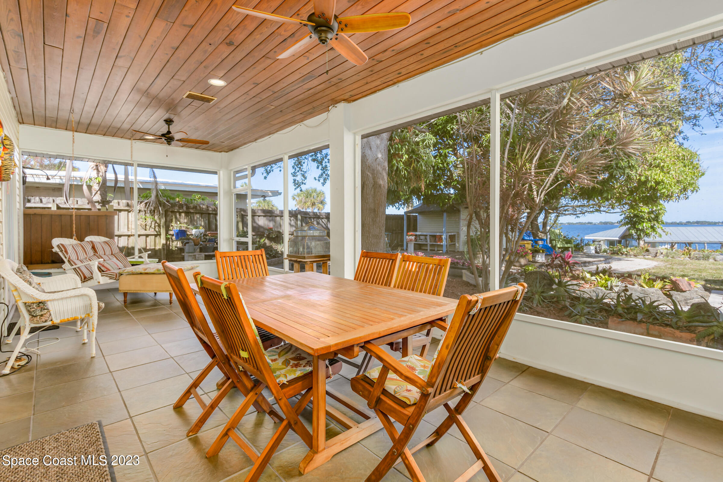 4553 Coquina Ridge Drive Melbourne, FL 32935 - Photo 14 of 51 a dining room with furniture a chandelier and pool table