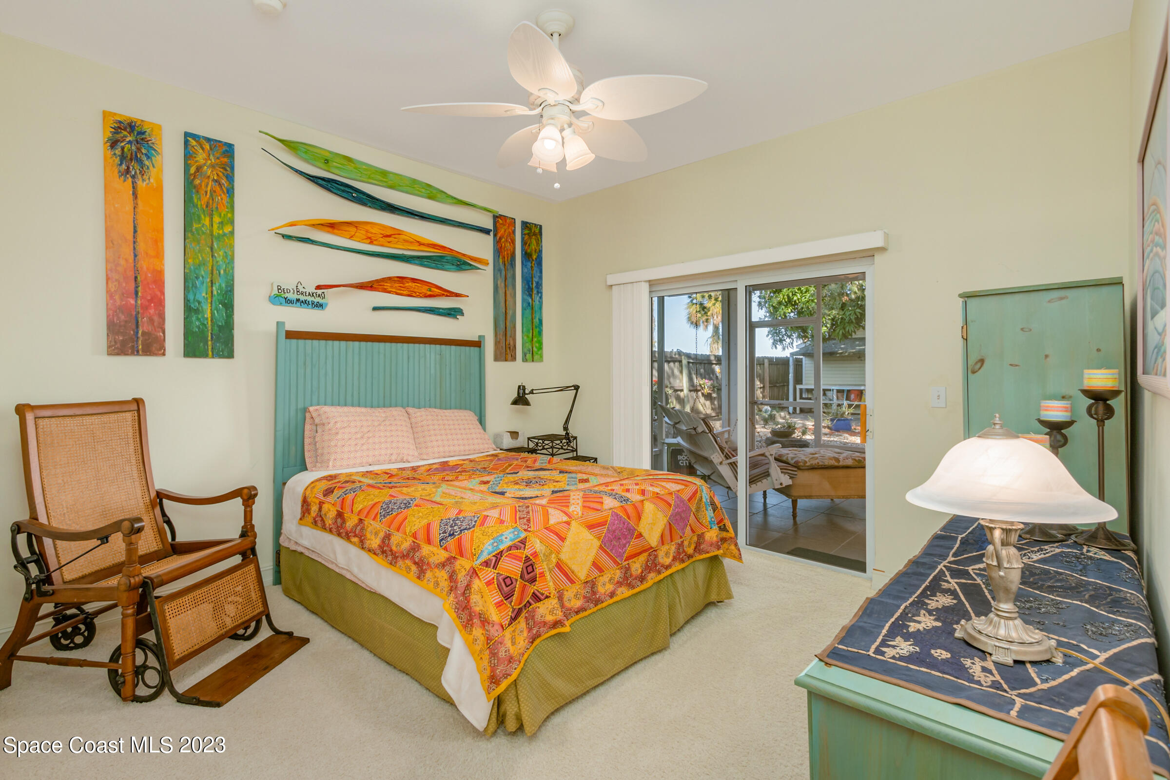 4553 Coquina Ridge Drive Melbourne, FL 32935 - Photo 26 of 51 a bedroom with a bed and window