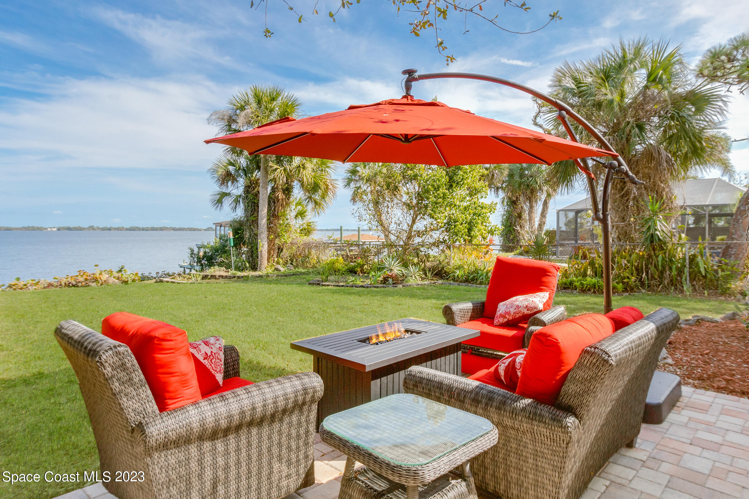 4553 Coquina Ridge Drive Melbourne, FL 32935 - Photo 32 of 51 a outdoor sitting area with furniture and garden view