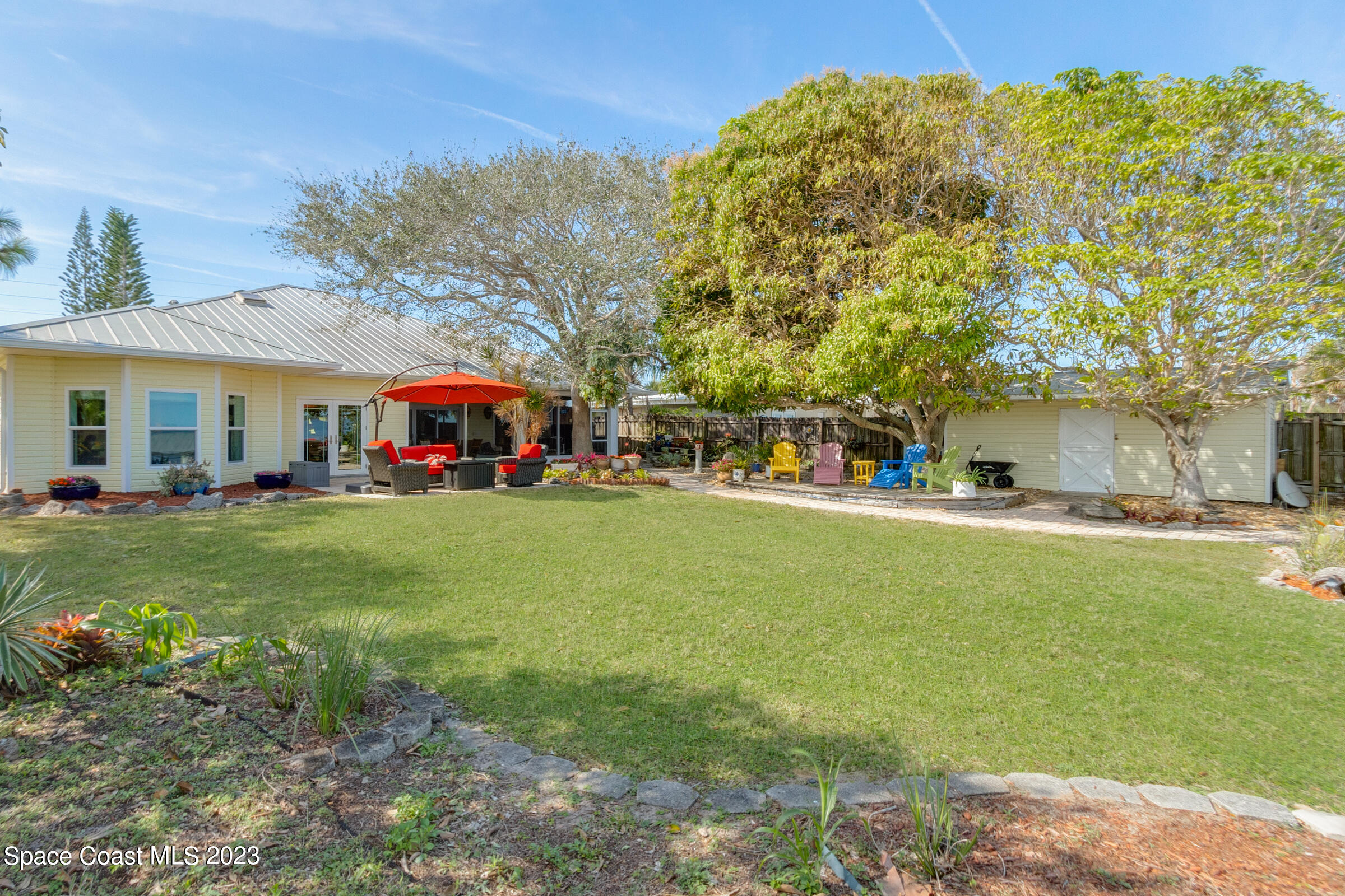 4553 Coquina Ridge Drive Melbourne, FL 32935 - Photo 40 of 51 a view of outdoor space yard and mountain
