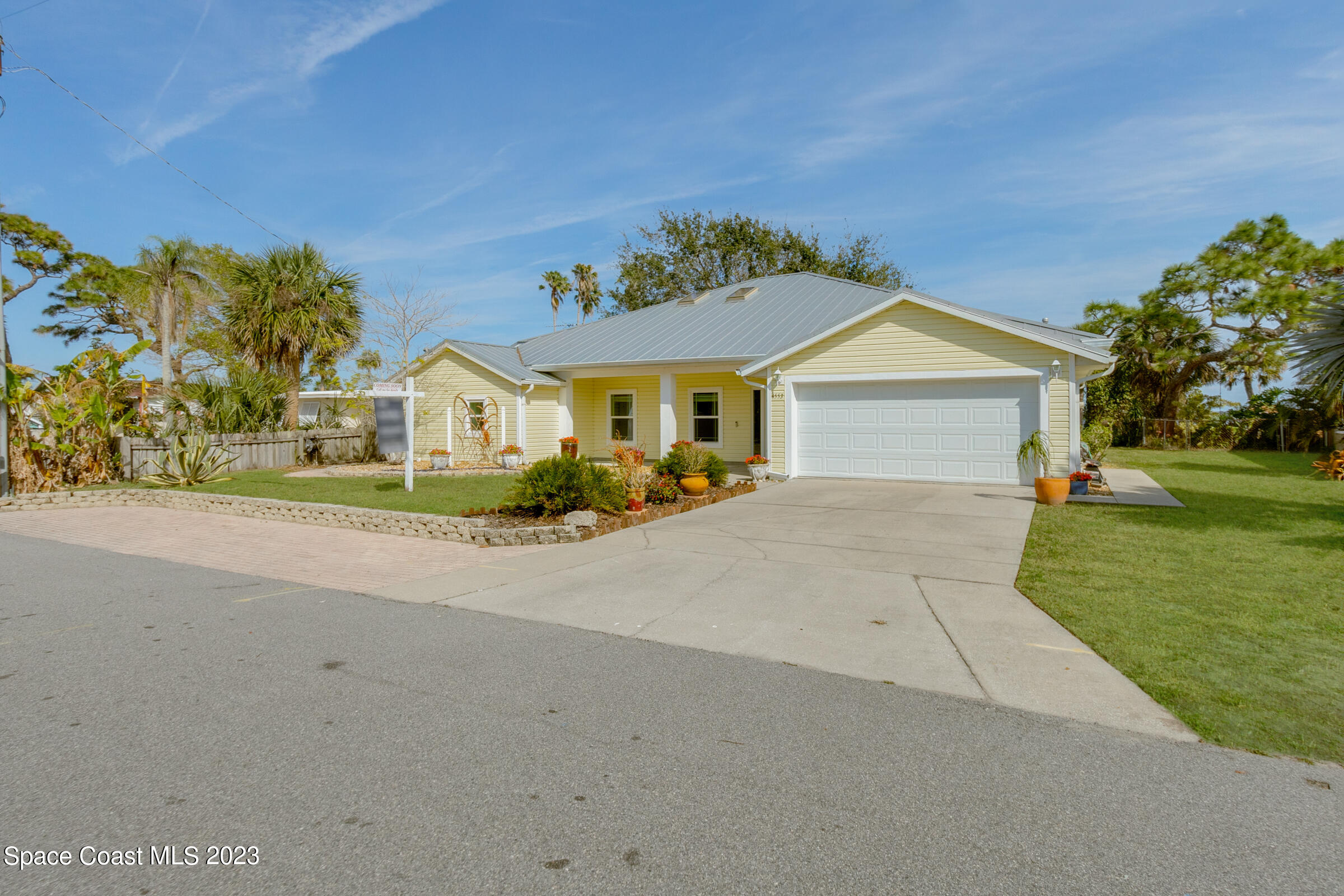 4553 Coquina Ridge Drive Melbourne, FL 32935 - Photo 7 of 51 front view of a house with a street