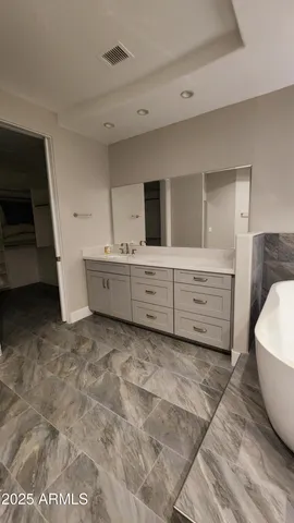 a room with furniture and a flat screen tv