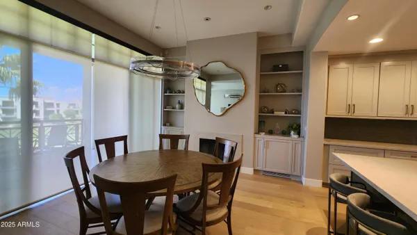 a view of a dining room and a table and chairs